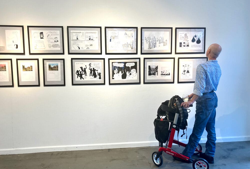 Exhibition visitor in front of works from the graphic novel series “Gestern haben wir viel getanzt” (“Yesterday we danced a lot”) by illustrator Nathalie Frank, Berlin 2023.